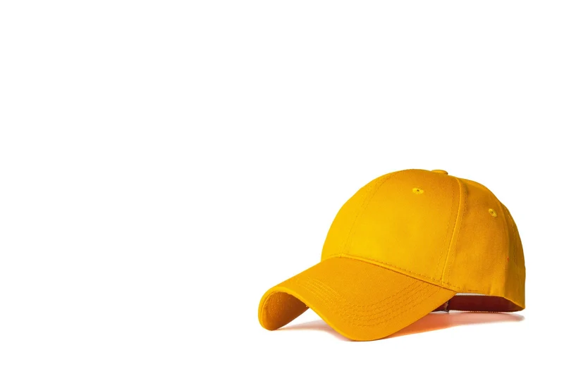 Yellow baseball cap on a white background (demo photo)